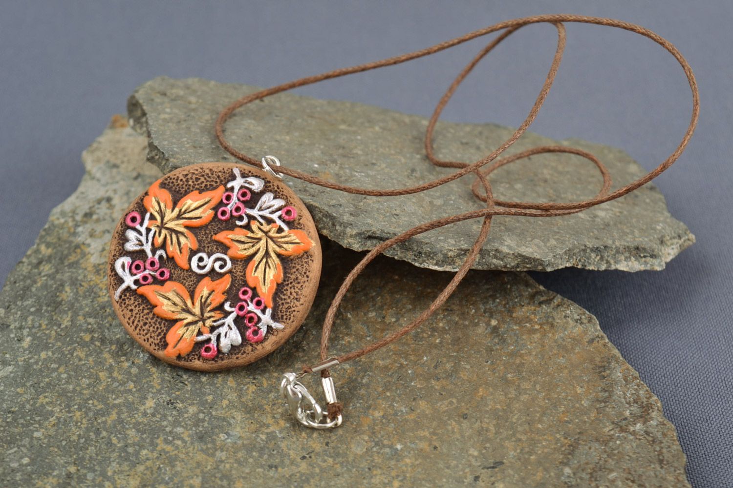 Handmade bright round ceramic pendant painted with acrylics in ethnic style  photo 1