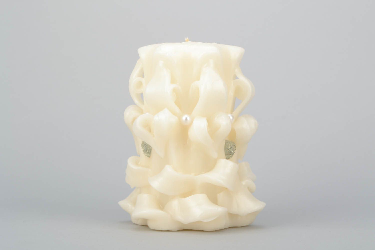 Carved white candle photo 3