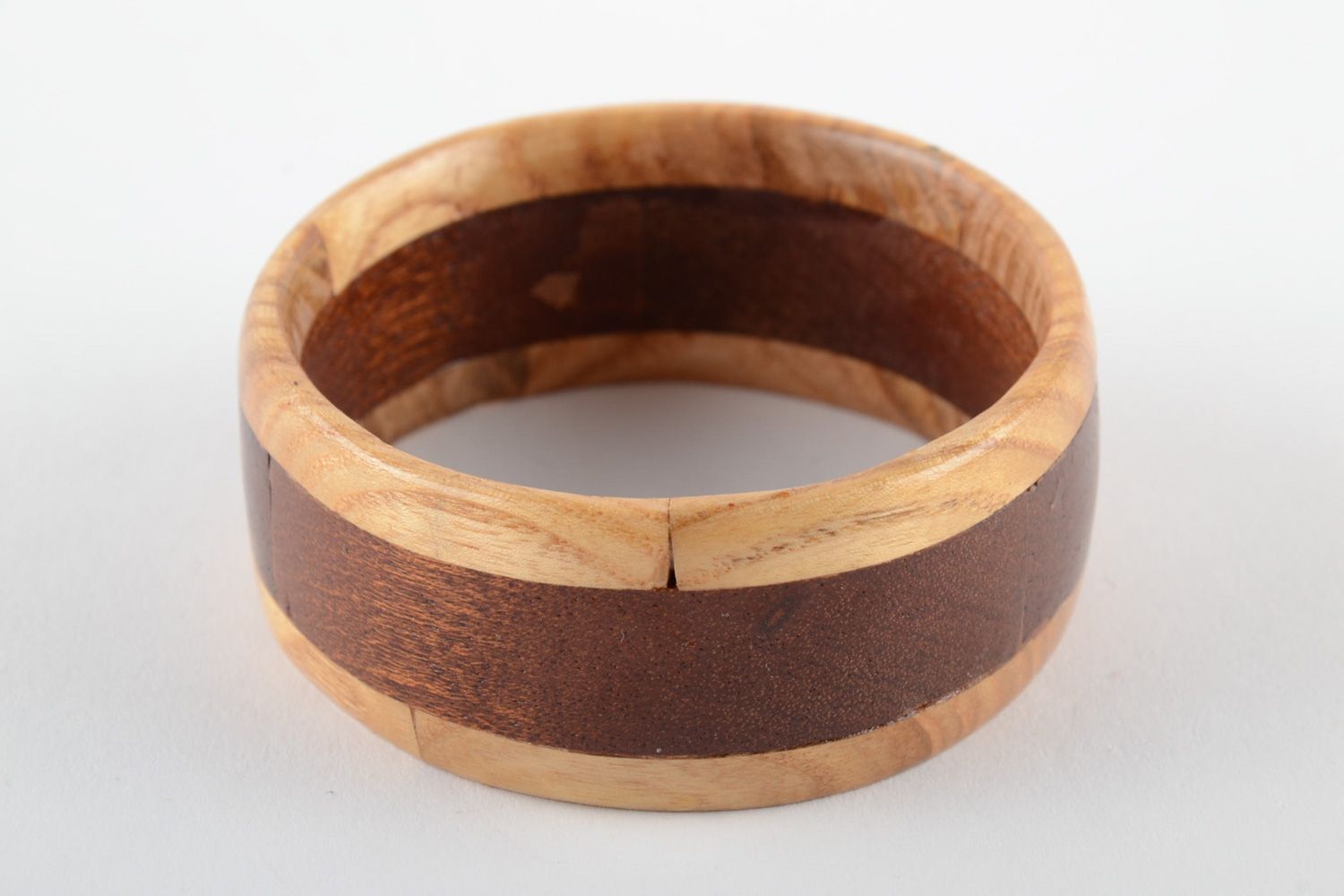 Wide two colored handmade wrist bracelet carved of wood with inlay for women  photo 3