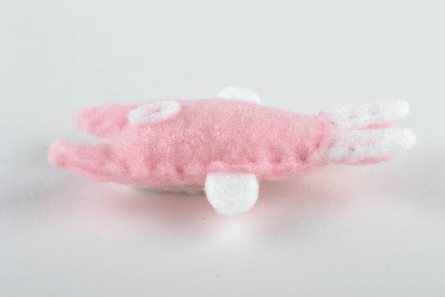 Toy earphone cord holder in the shape of pink hare photo 2