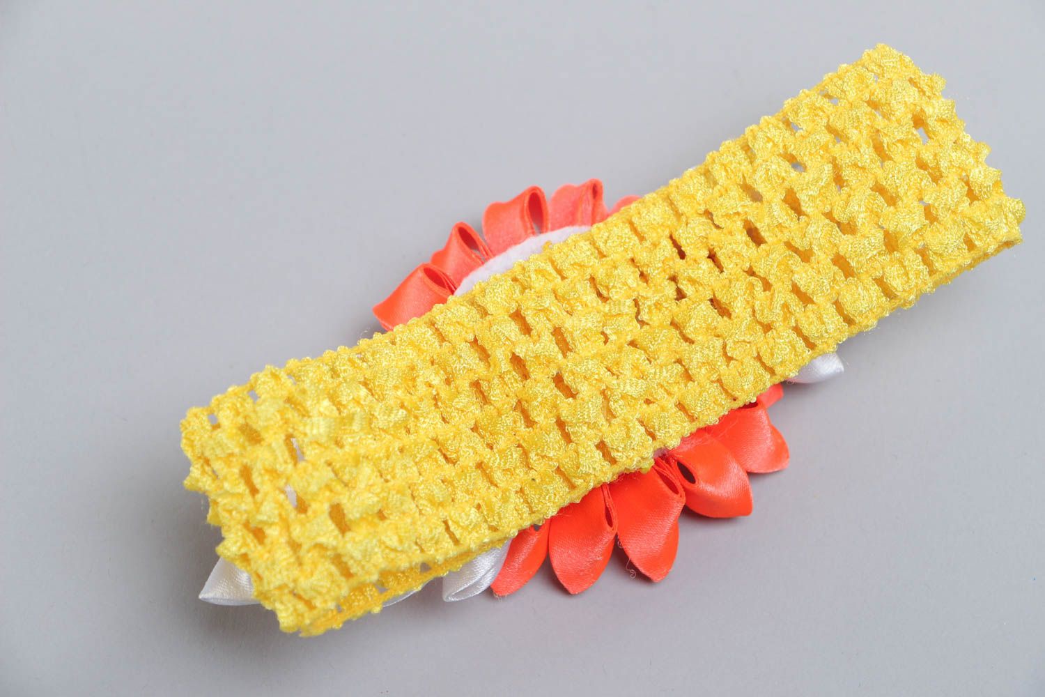 Handmade designer headband with yellow stretch basis and bright kanzashi flower photo 4