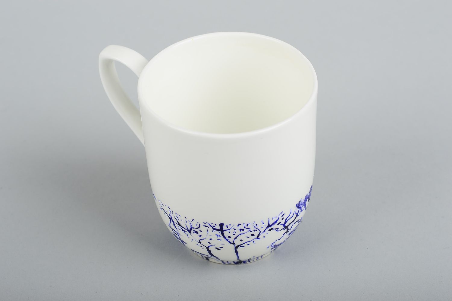 White porcelain tea cup with handle and handpainted blue pink painted pattern photo 4