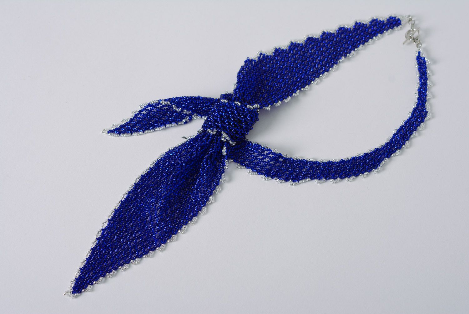 Unusual festive blue woven beaded necklace in the shape of tie photo 1