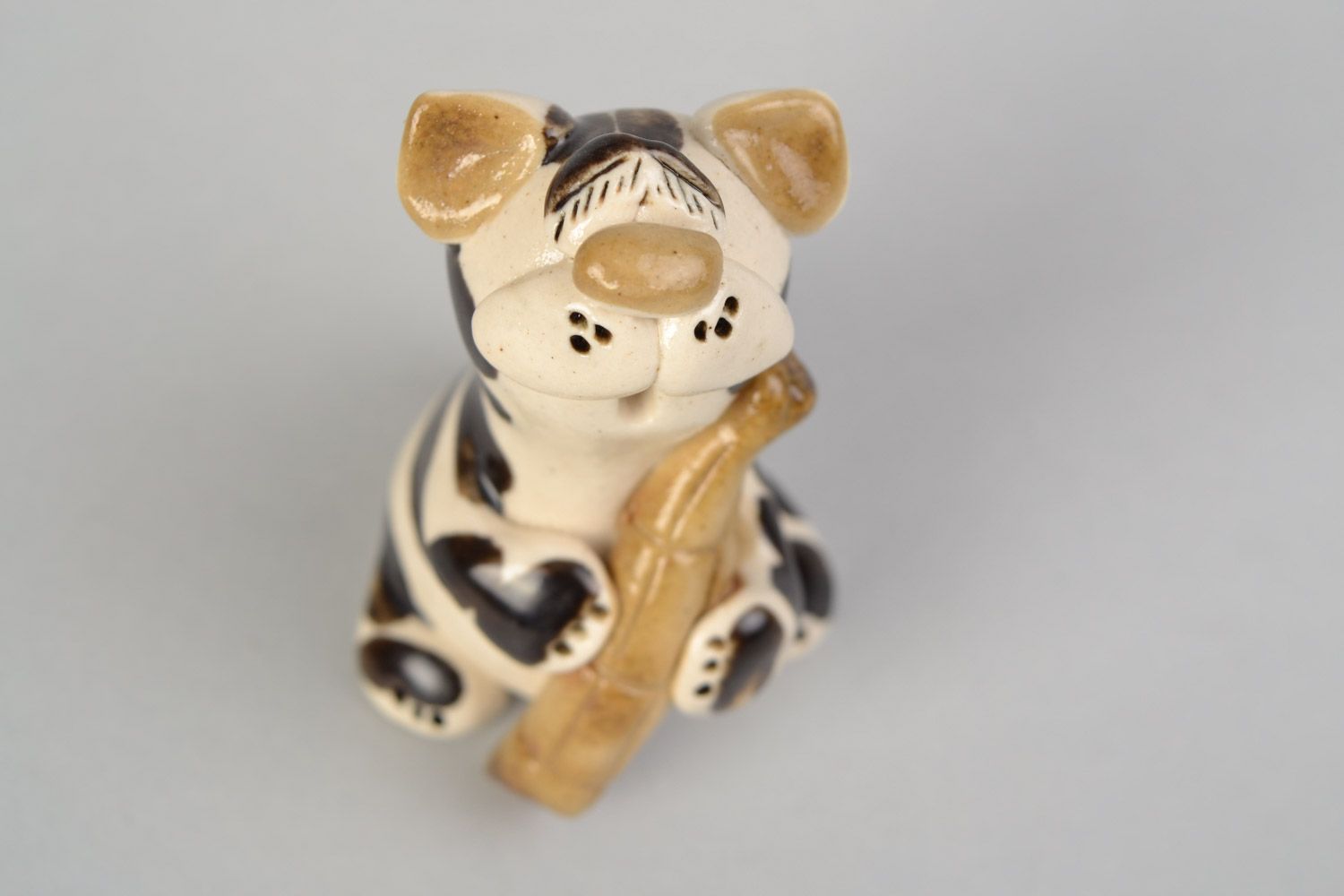Handmade designer ceramic figurine of kitten with sausage painted with glaze photo 3