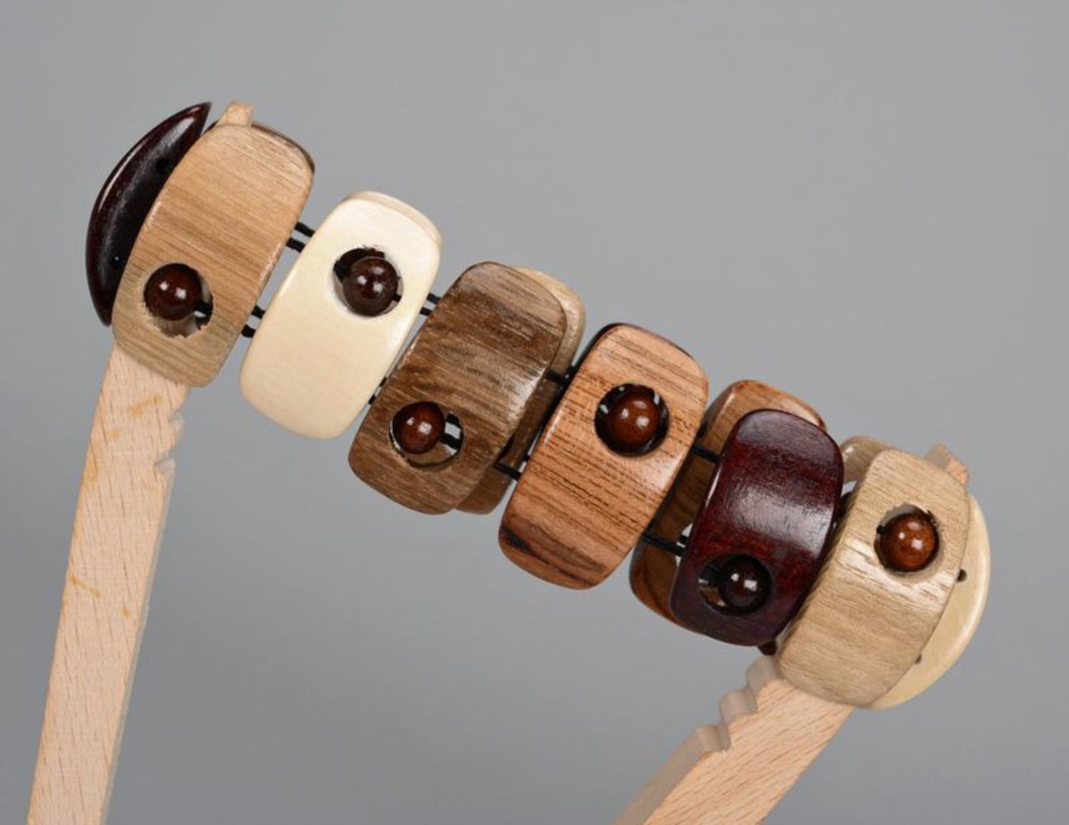 Beautiful brown wrist bracelet with round beads photo 3