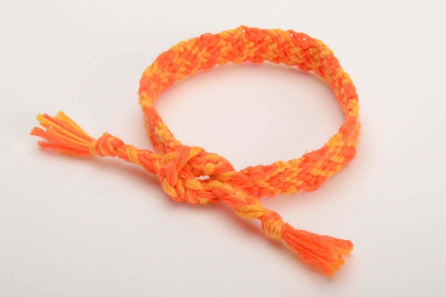 Handmade wrist friendship bracelet woven of orange embroidery floss for women photo 3