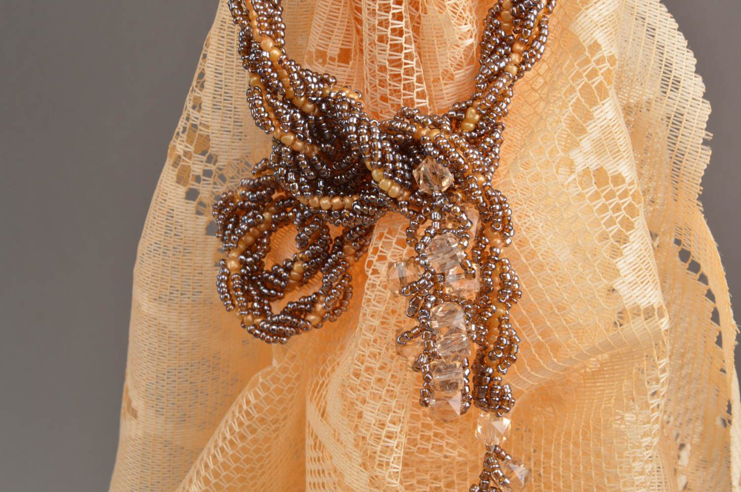 Handmade unusual delicate stylish tiebacks made of beads in bronze color photo 3