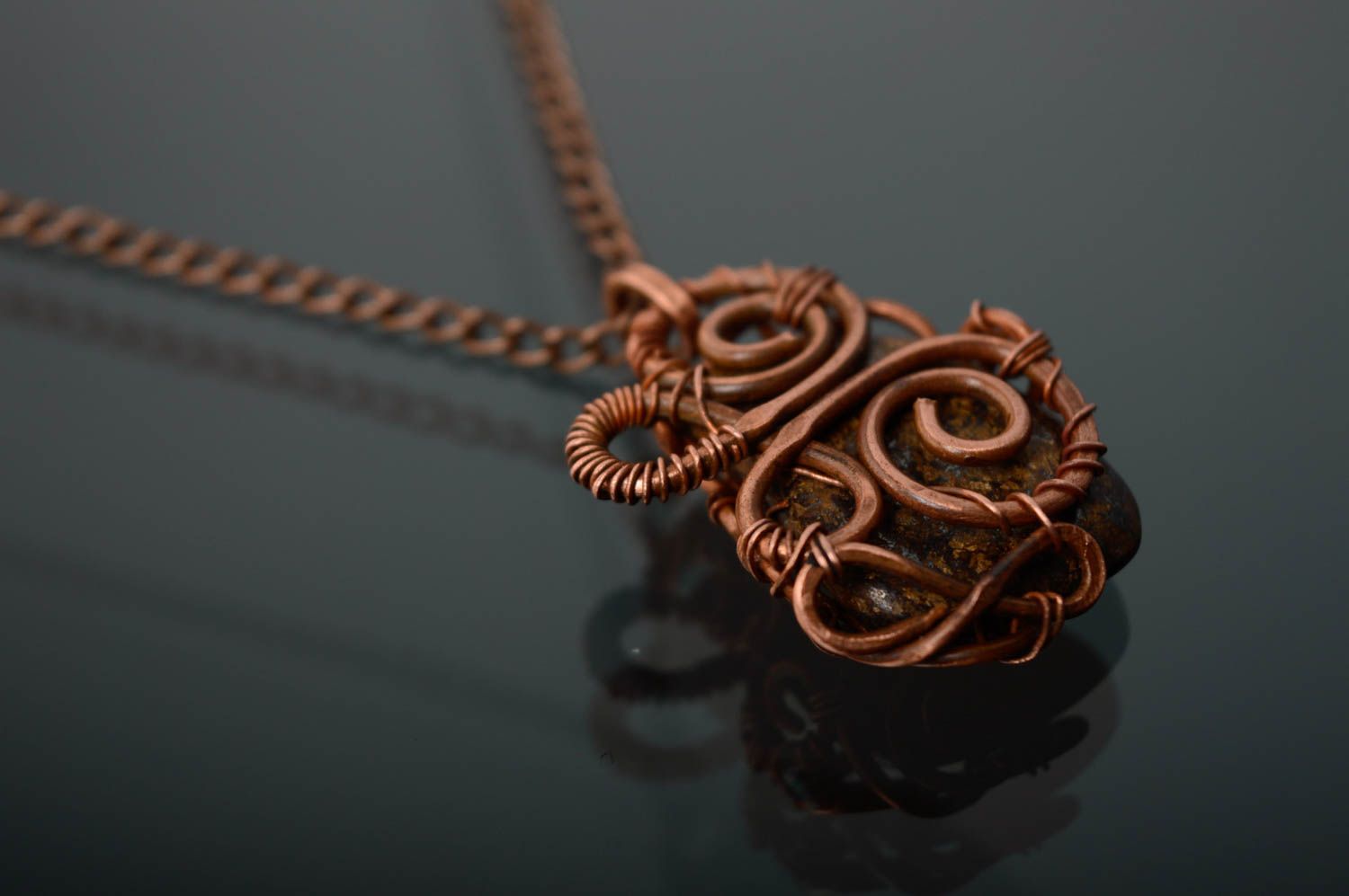 Copper pendant with natural bronzite stone photo 3