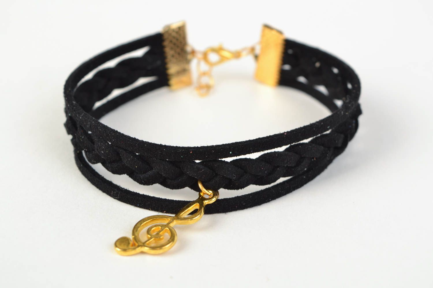 Handmade black suede woven bracelet with charm in the shape of treble clef photo 2