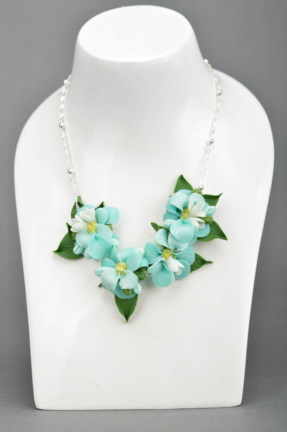 Handmade tender feminine necklace with polymer clay light flowers on metal chain photo 1