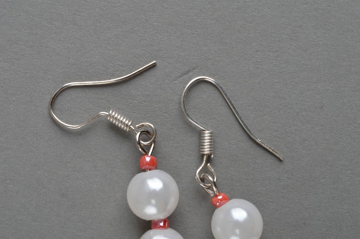 Handmade female earrings festive white beaded jewelry stylish accessories photo 4