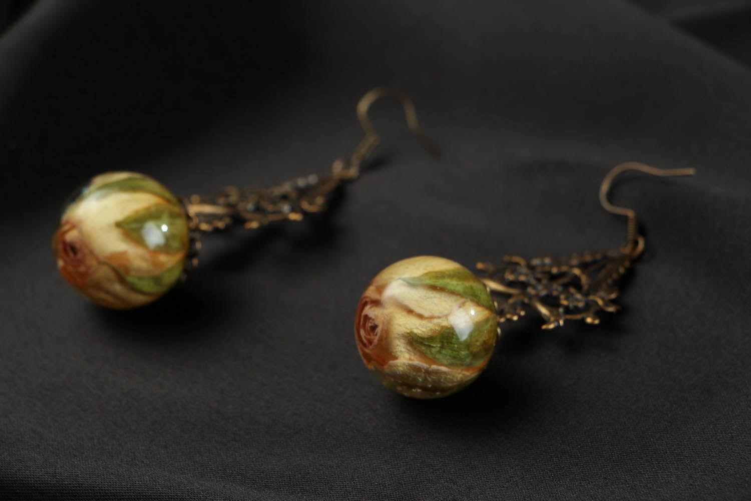 Earrings with rose buds in epoxy resin photo 2