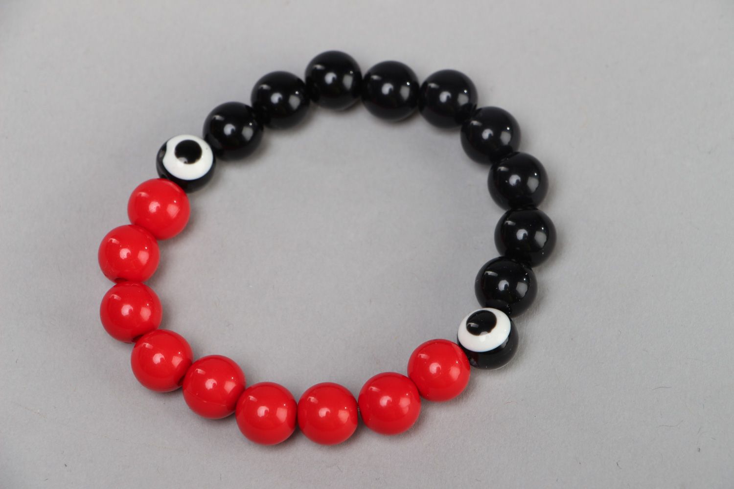 Handmade stretch wrist bracelet with red and black plastic beads for women photo 2
