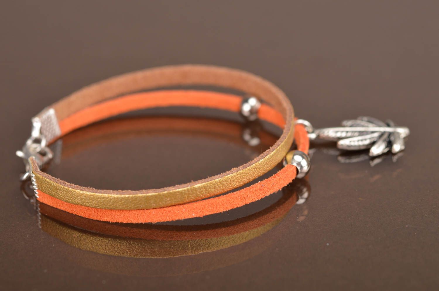 Handmade designer women's genuine leather cord bracelet with metal charm Leaf photo 4