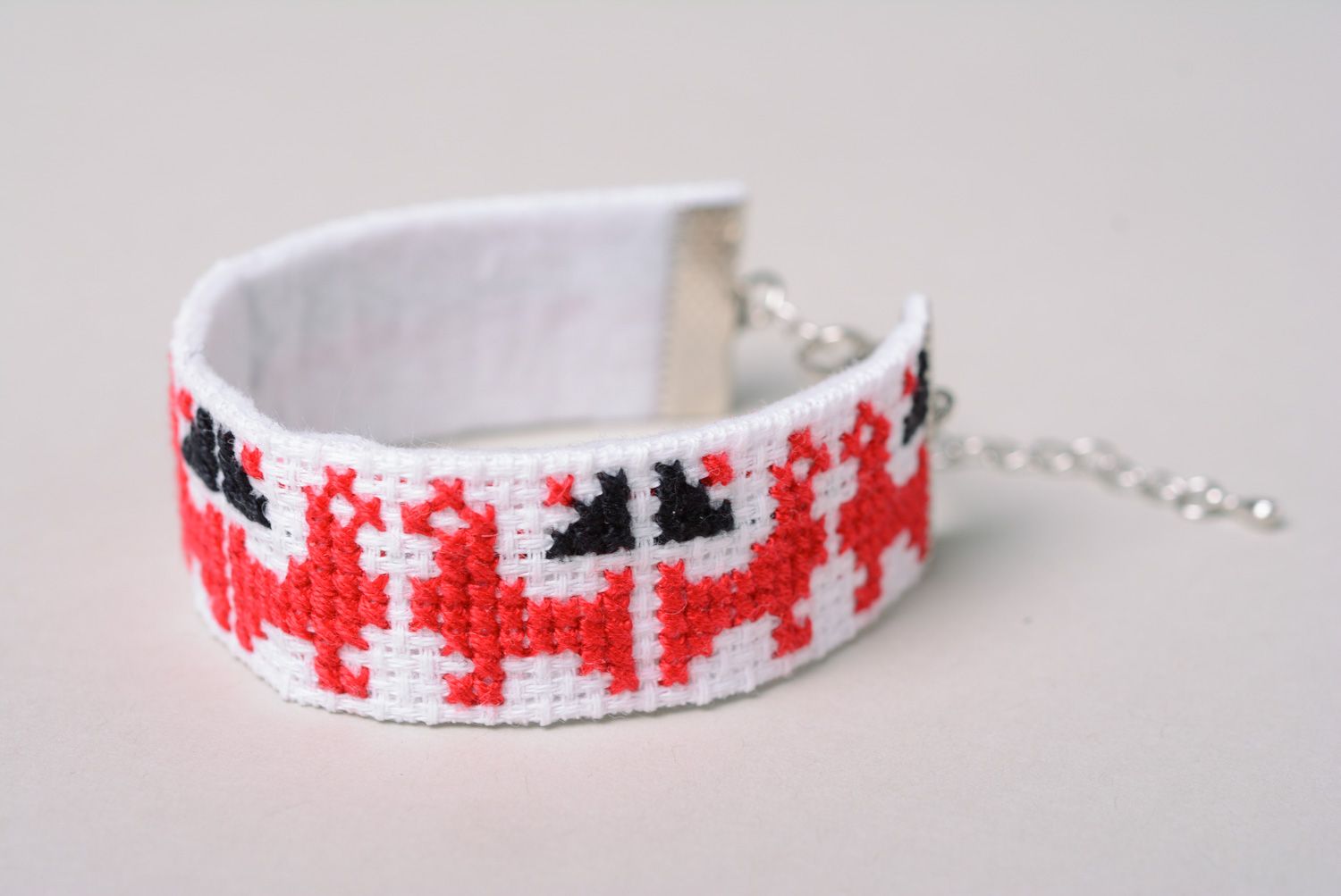 Handmade women's wrist bracelet with embroidery in white and red colors  photo 2