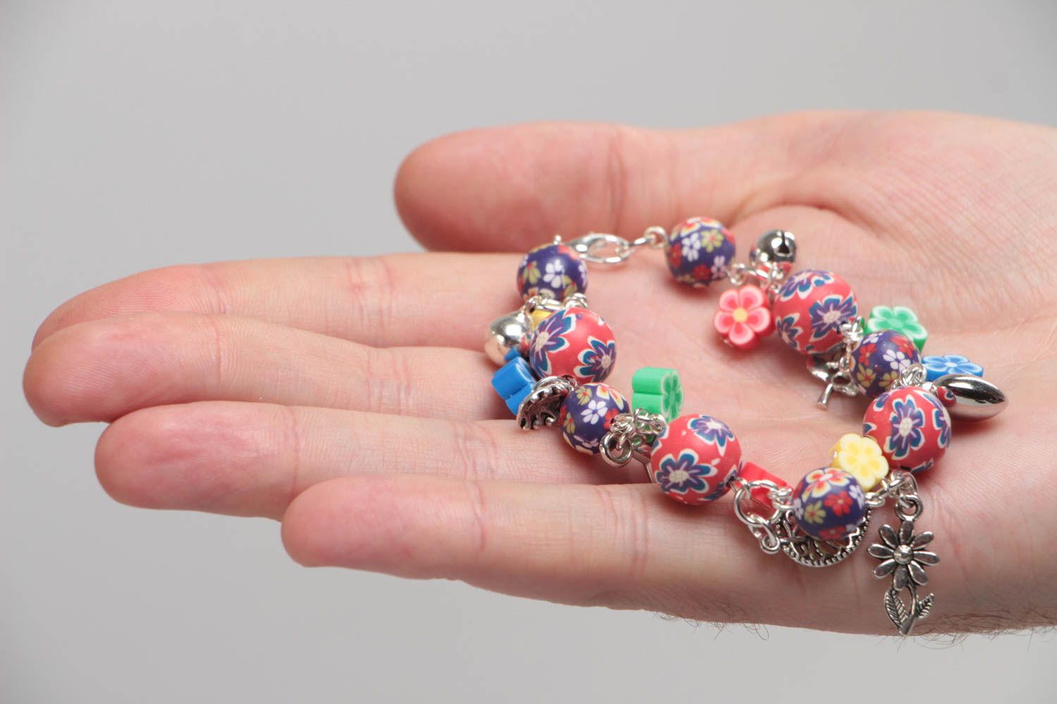 Bright handmade children's polymer clay wrist bracelet with beads and charms photo 5