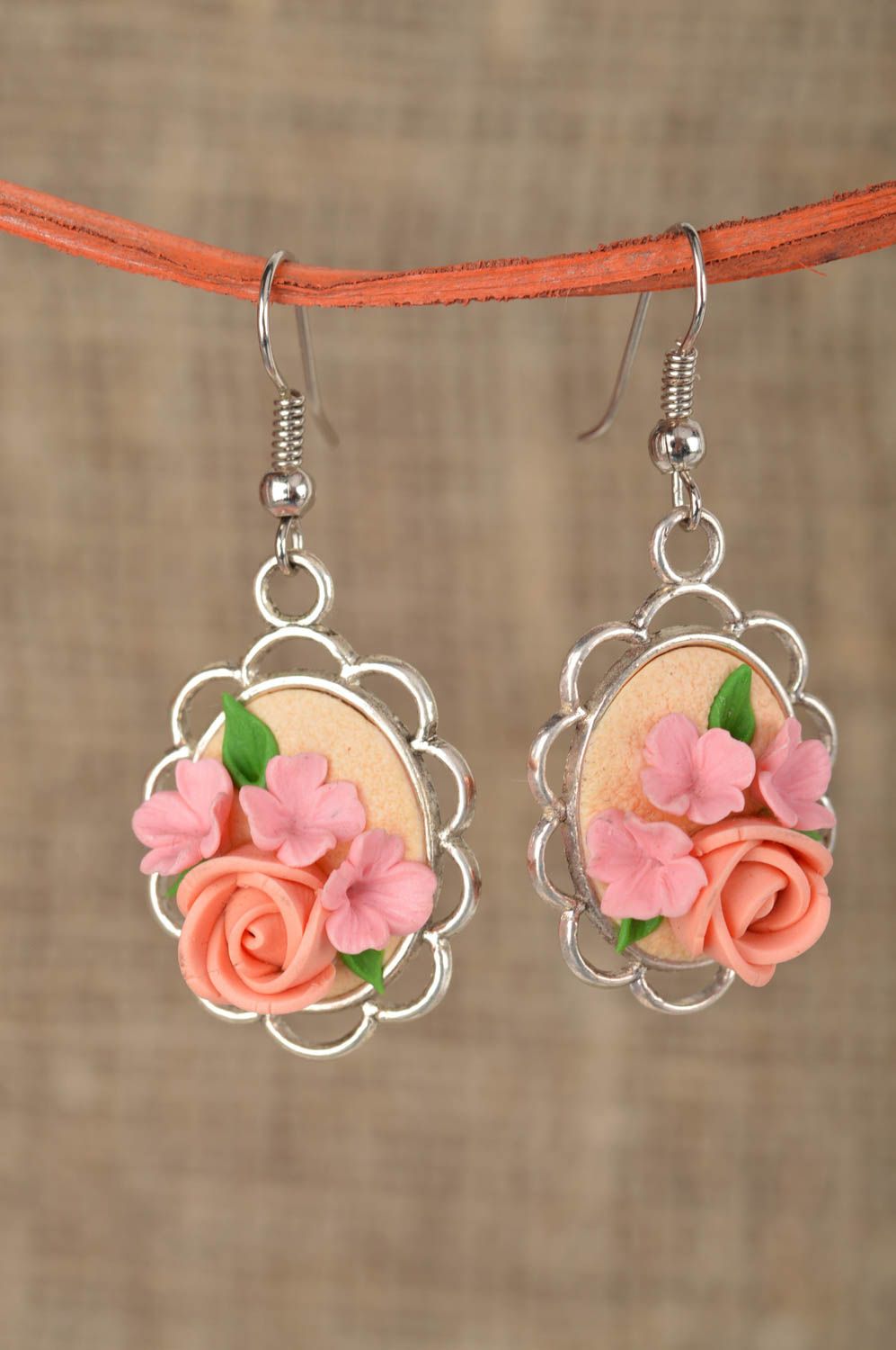 Oval earrings with charms made of polymer clay in the form of flowers hand made photo 1