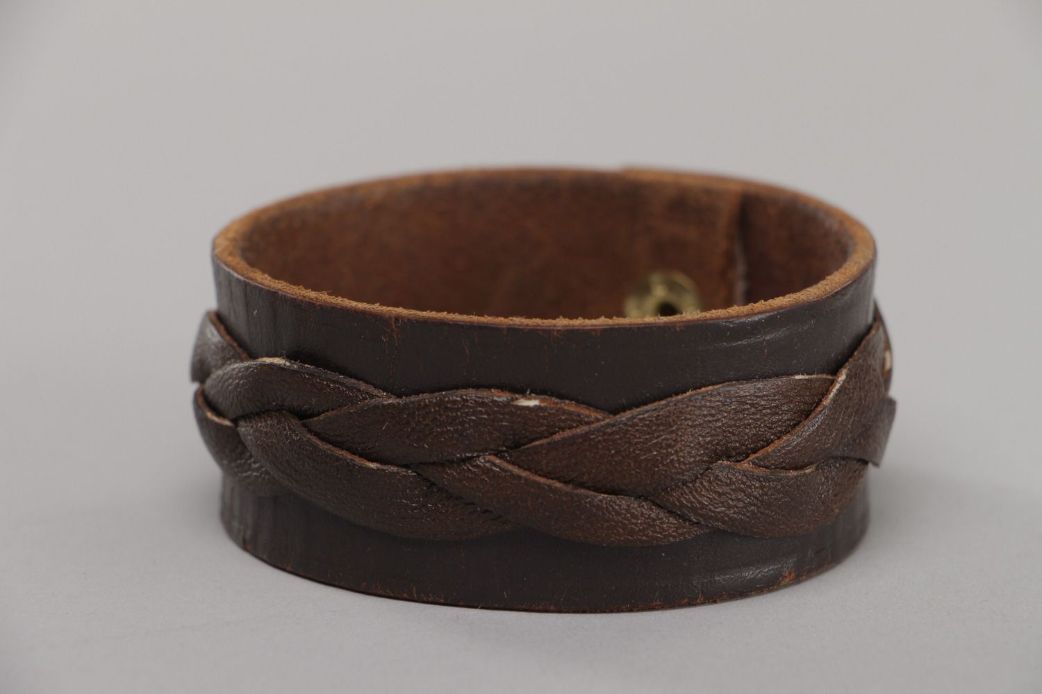 Handmade wrist bracelet woven of genuine brown leather with metal stud unisex photo 2