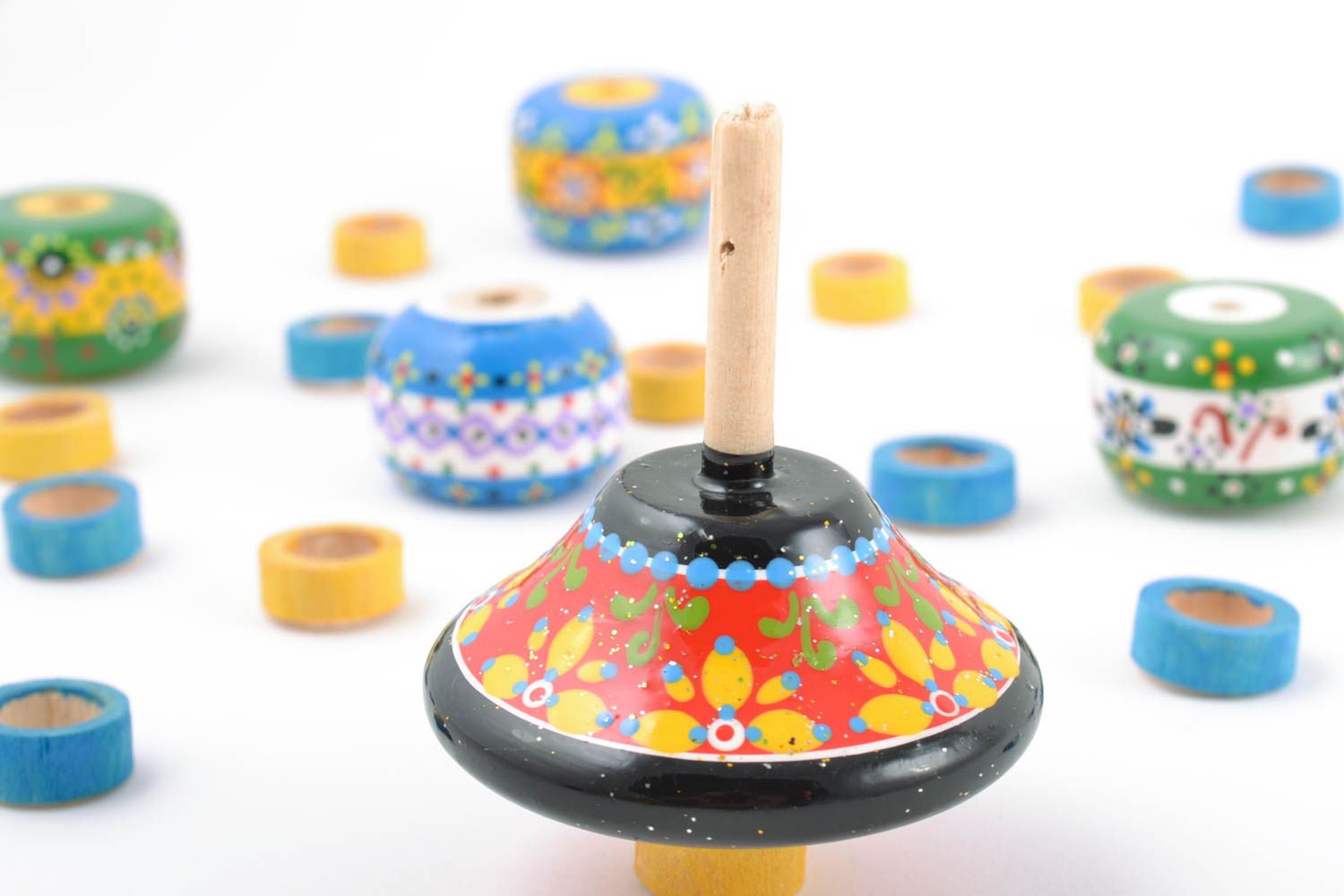 Bright painted handmade wooden toy spinning top for children photo 1