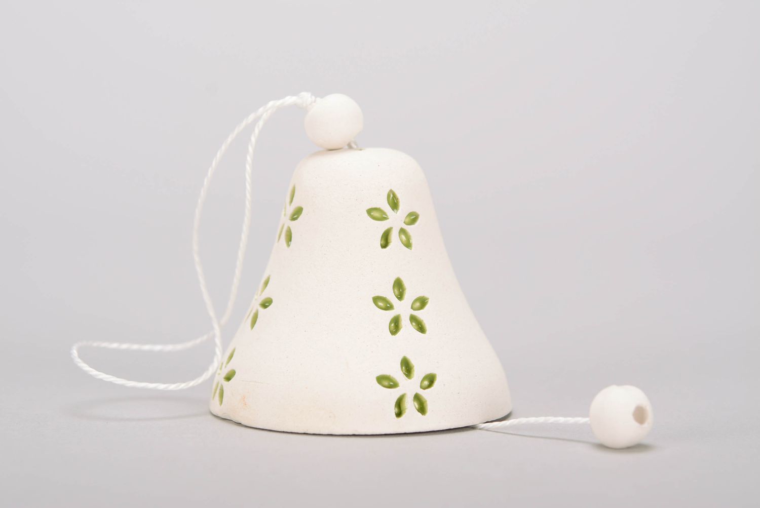 Bell handmade made of white clay photo 3