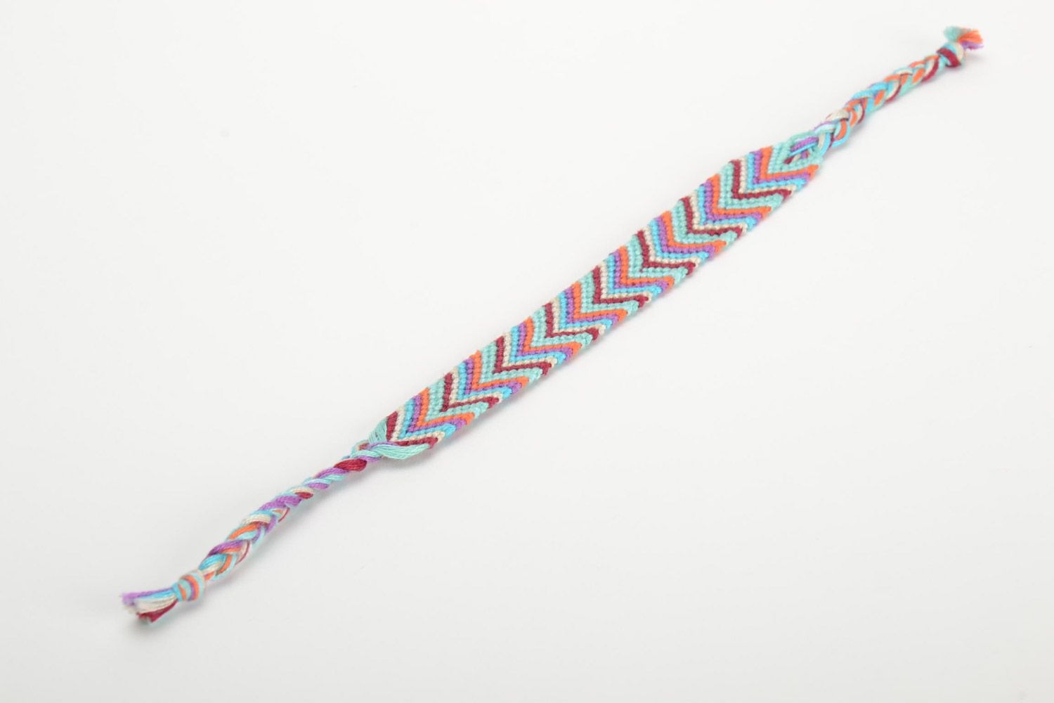Handmade stylish friendship wrist bracelet woven of colorful embroidery floss photo 2