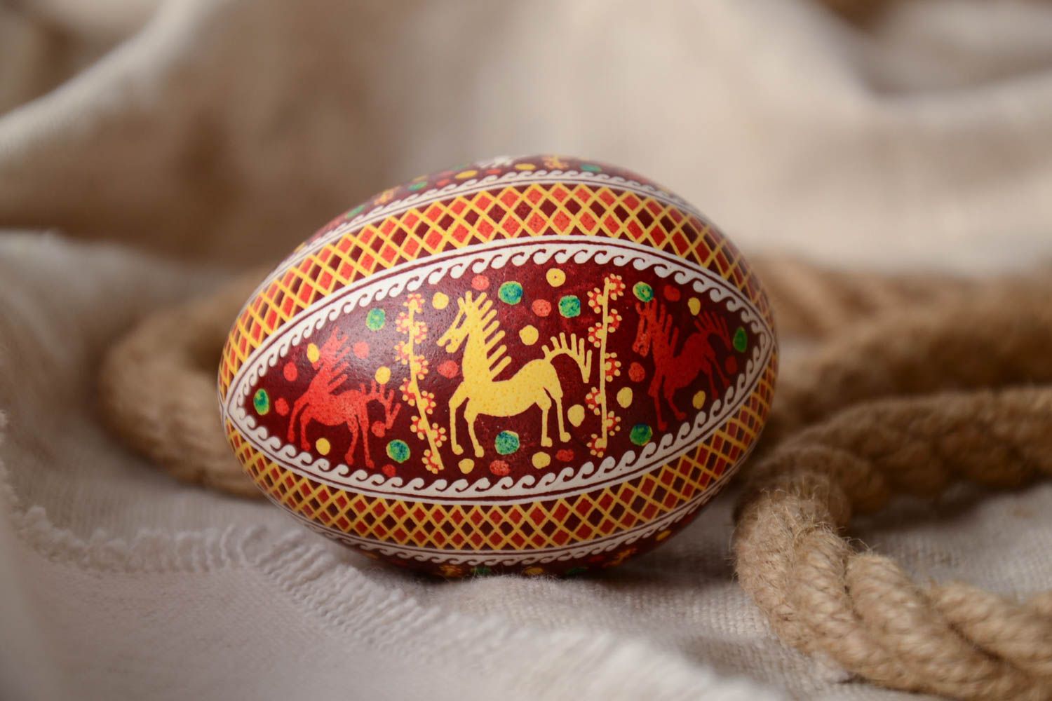 Homemade designer painted Easter egg with horse pattern created using waxing technique photo 1