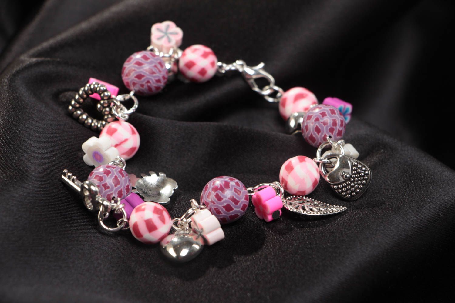 Handmade pink children's polymer clay wrist bracelet with charms photo 1