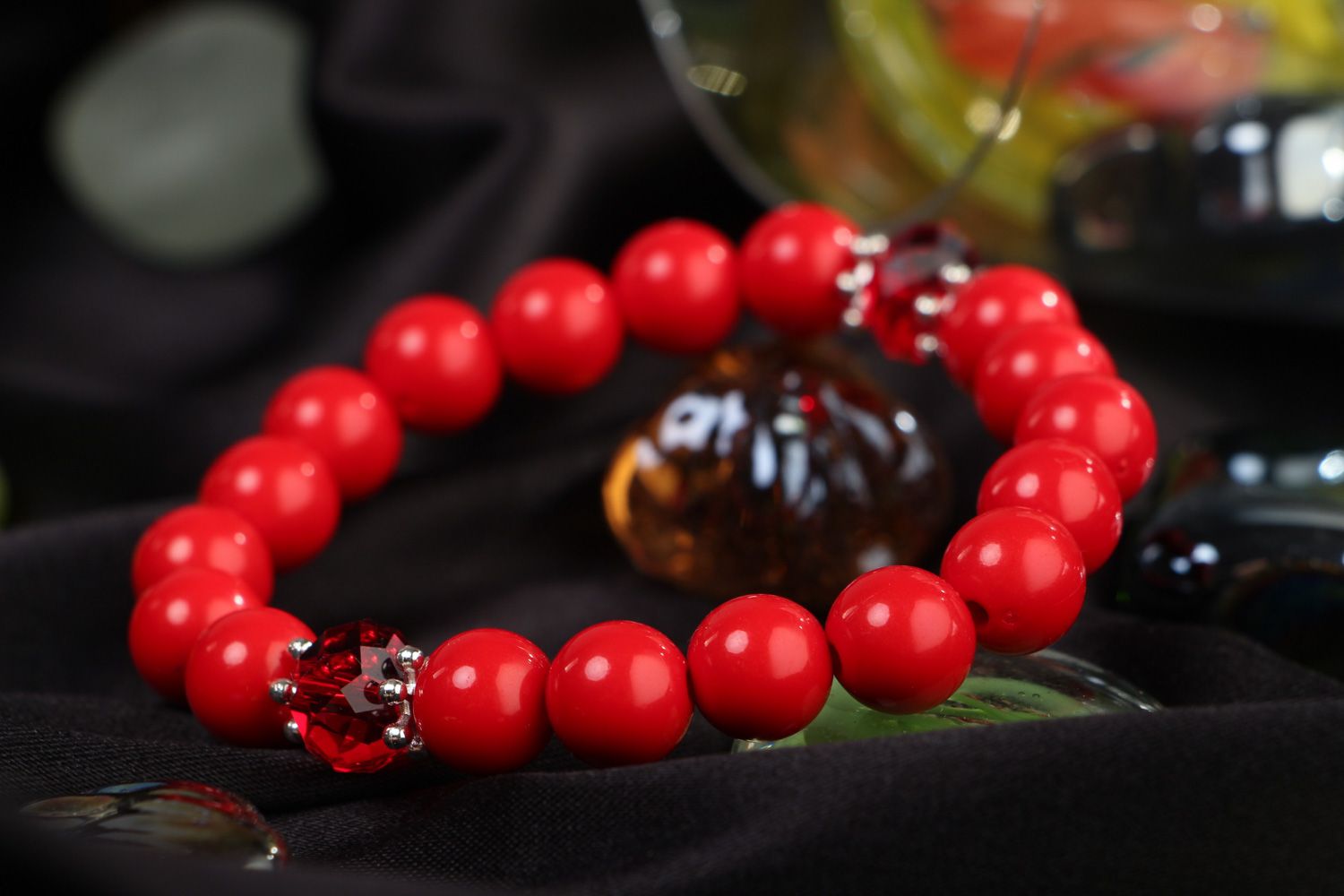 Handmade wrist bracelet with bright red plastic and glass beads for women photo 4