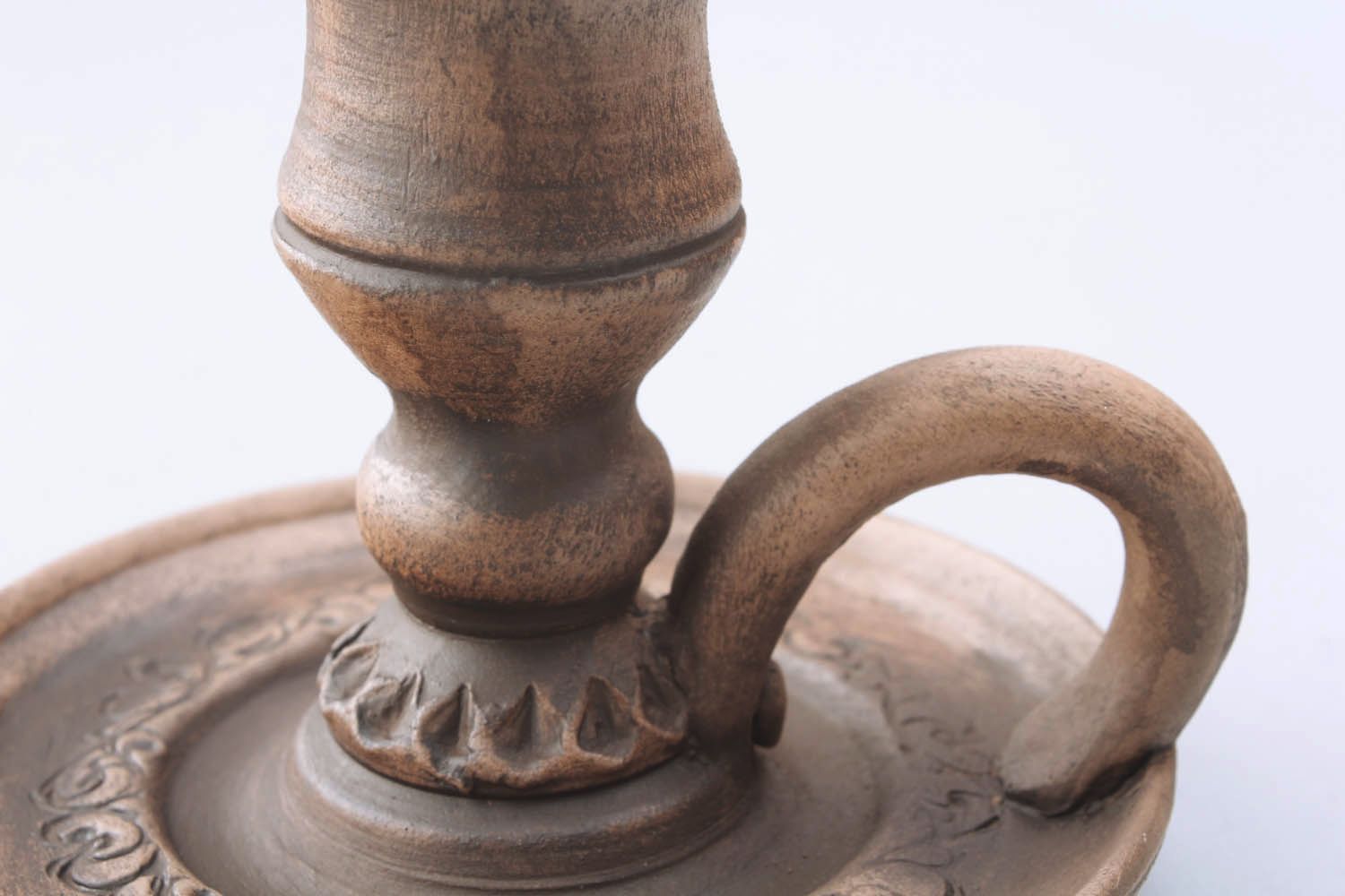 Candlestick made of red clay photo 5