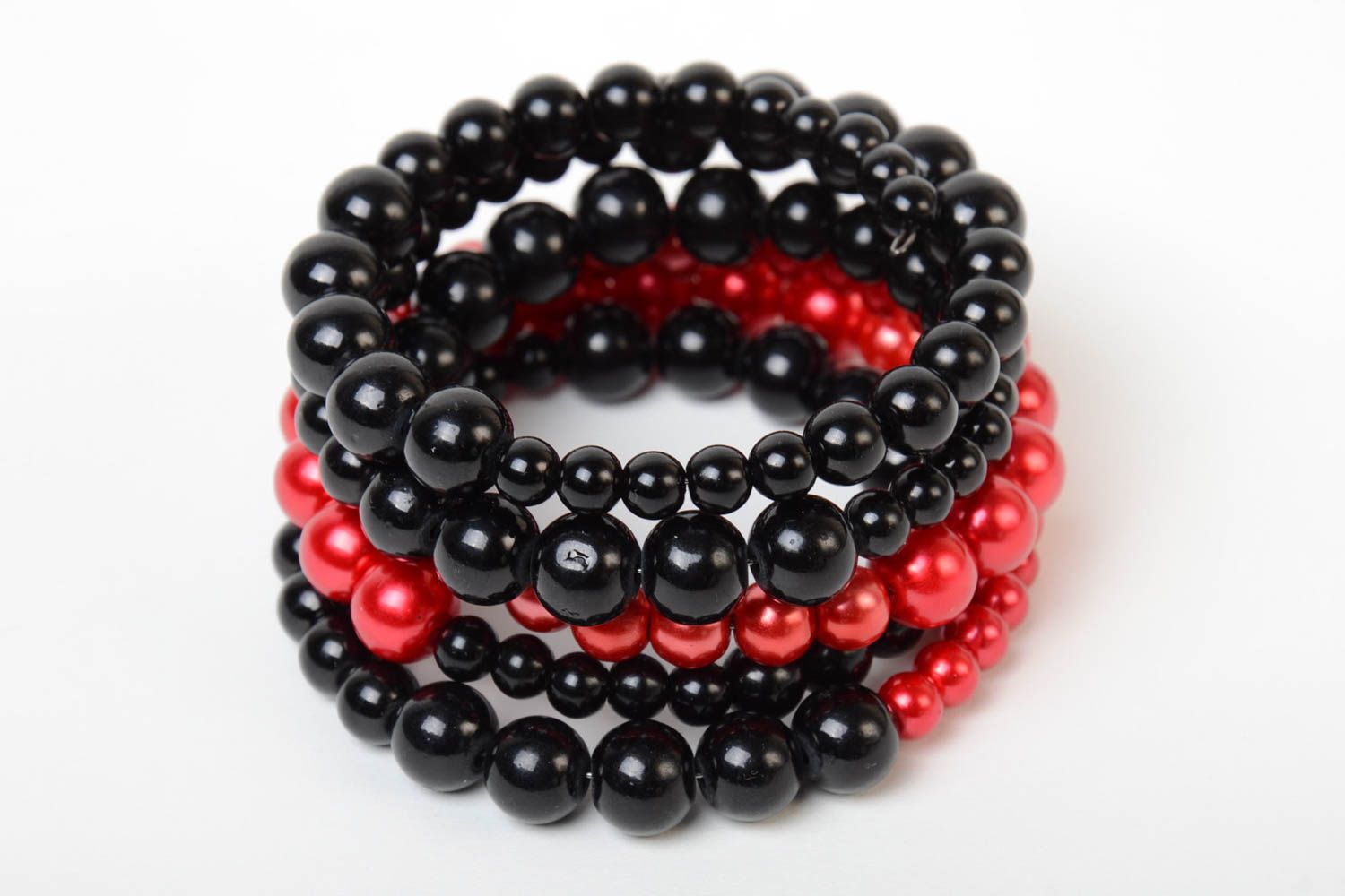 Red and black handmade designer wrist bracelet woven of plastic beads photo 2
