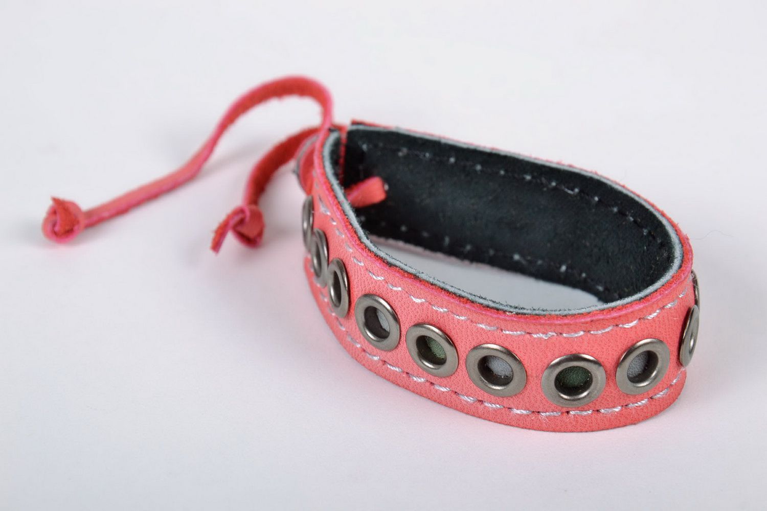 Pink bracelet with rivets photo 2