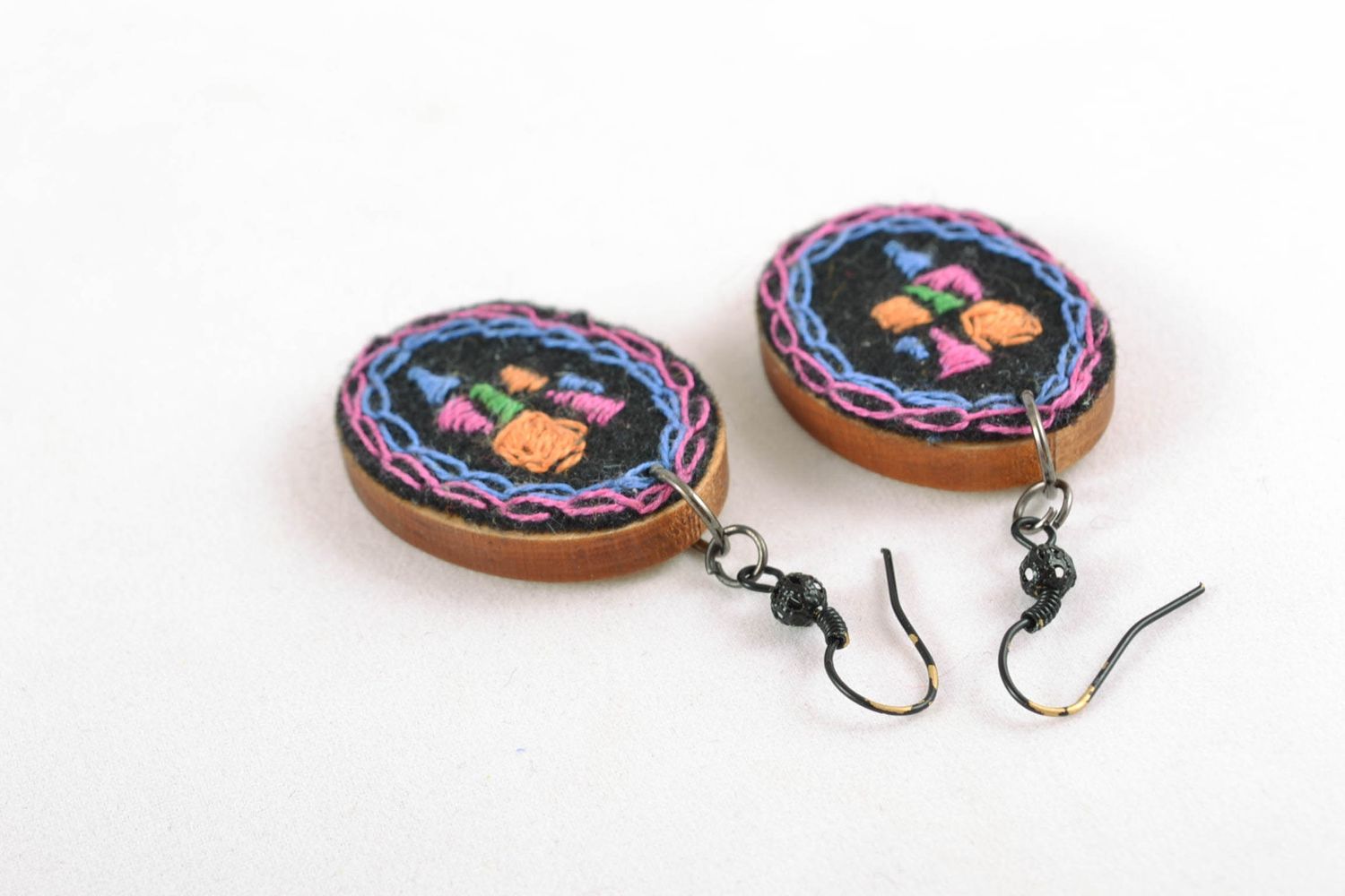 Designer fashionable embroidered earrings of oval shape photo 4