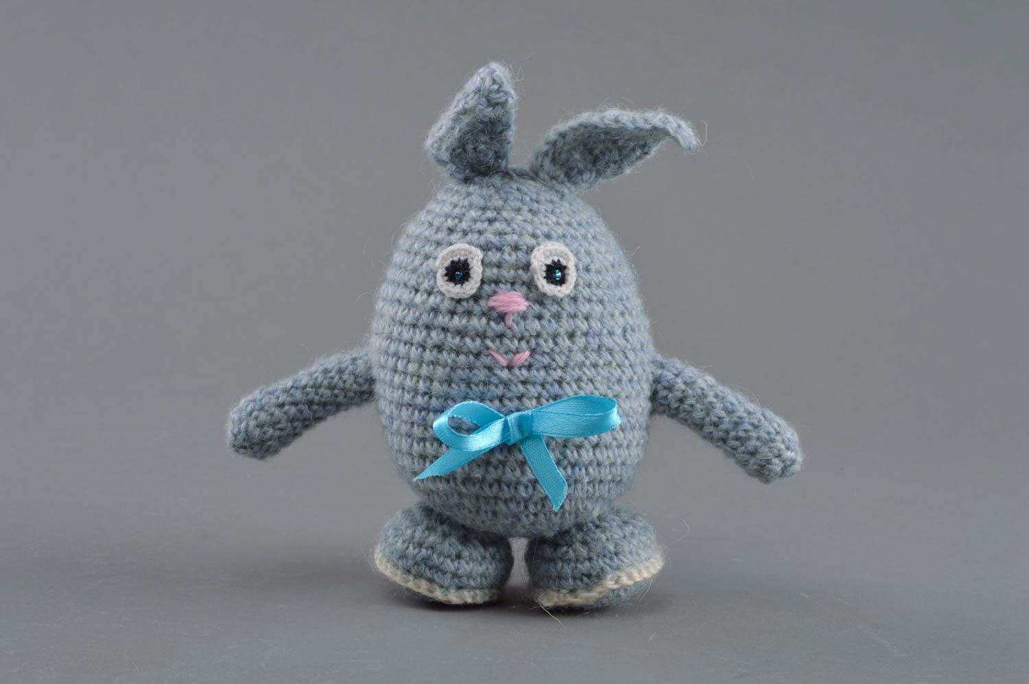 Soft toy in the form of crocheted gray hare with bow handmade stuffed doll photo 1