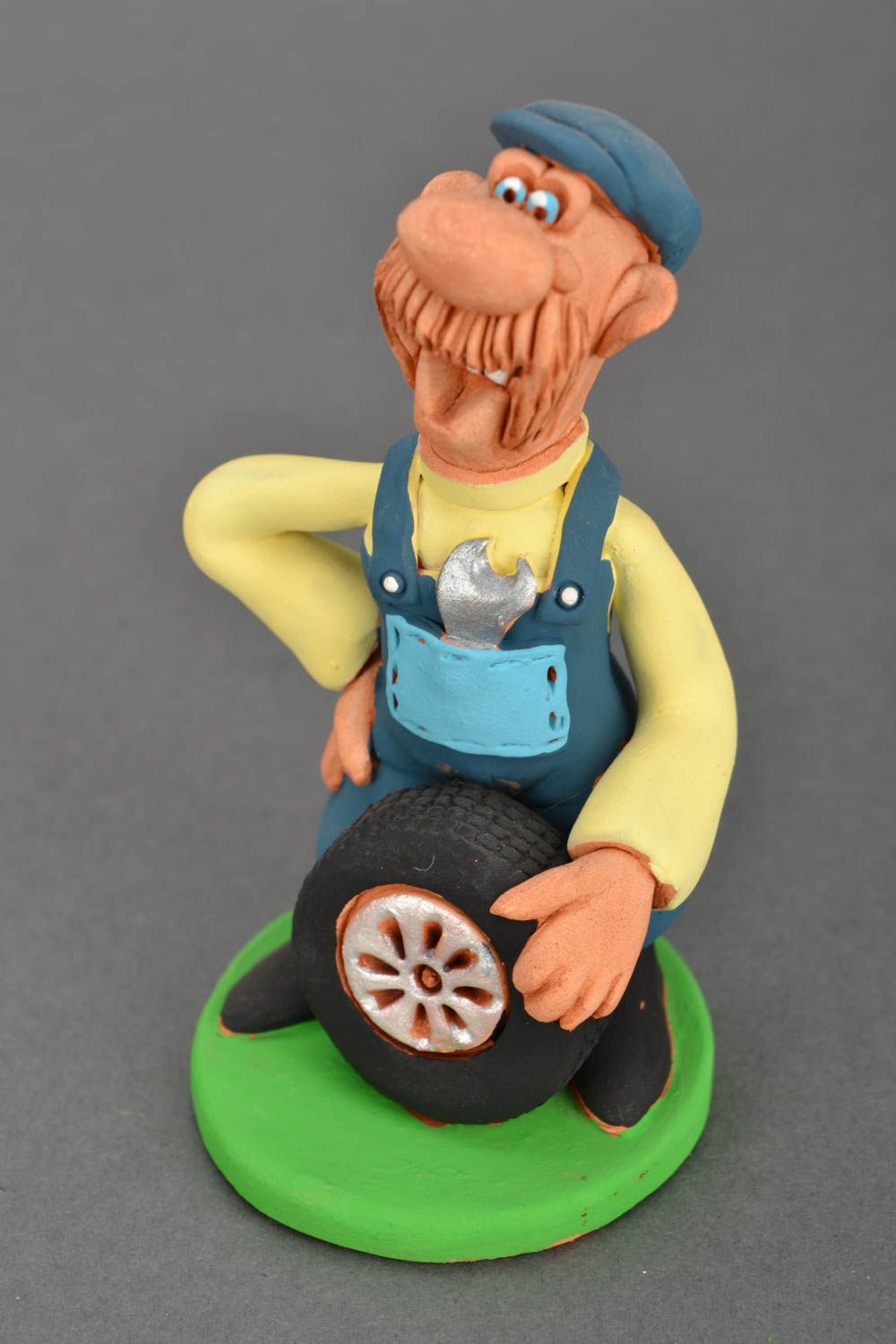 Figura cerámica Montador de neumáticos foto 3