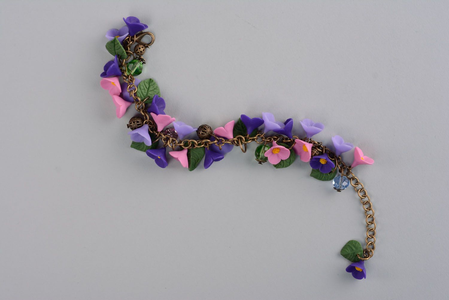 Dark blue, light blue, pink lilac flowers' bracelet for a girl photo 1