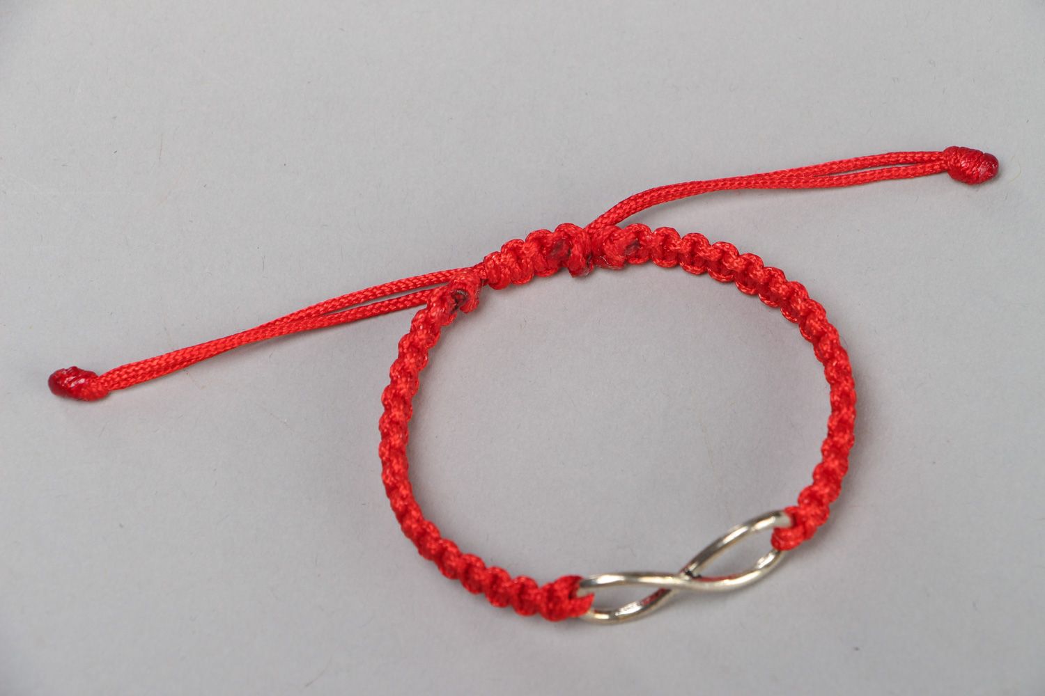 Handmade wrist friendship bracelet with synthetic cord of red color Eternity photo 2
