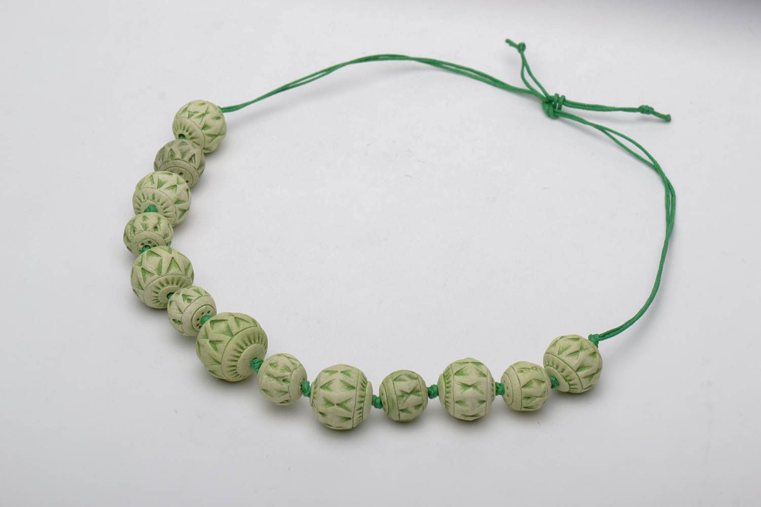 Clay bead necklace of green color photo 3
