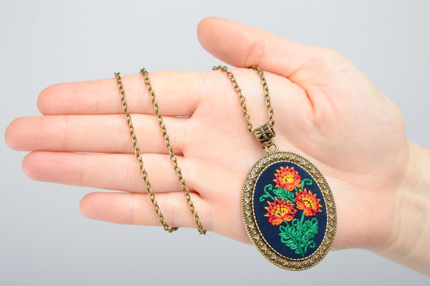 Vintage pendant with embroidery photo 3