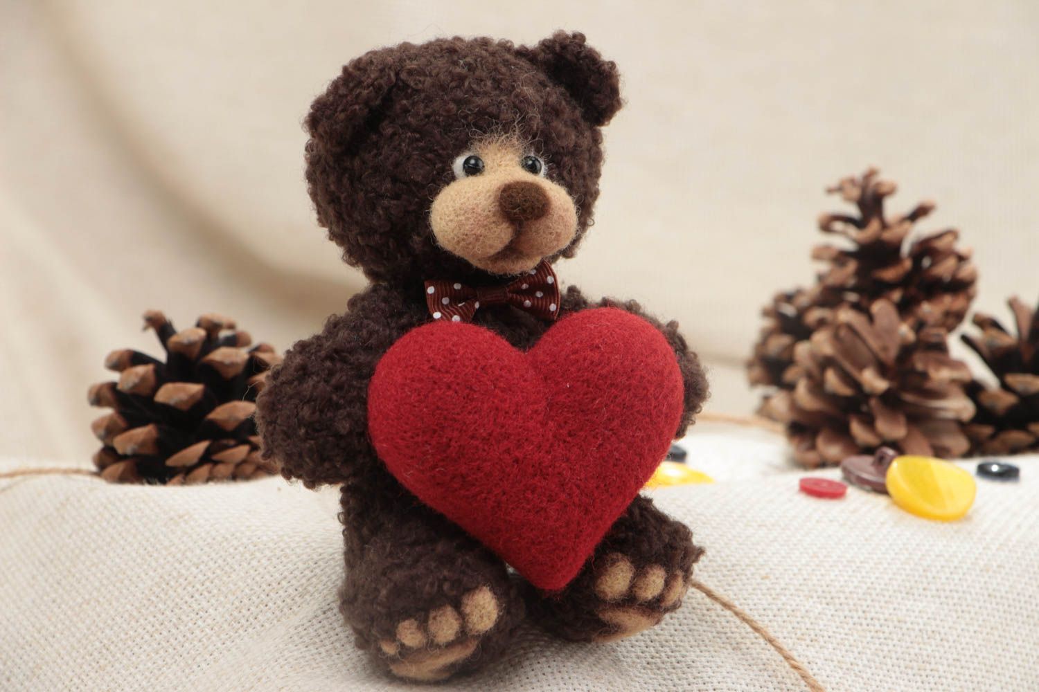Handmade soft toy crocheted of wool and yarns brown bear with big red heart photo 1