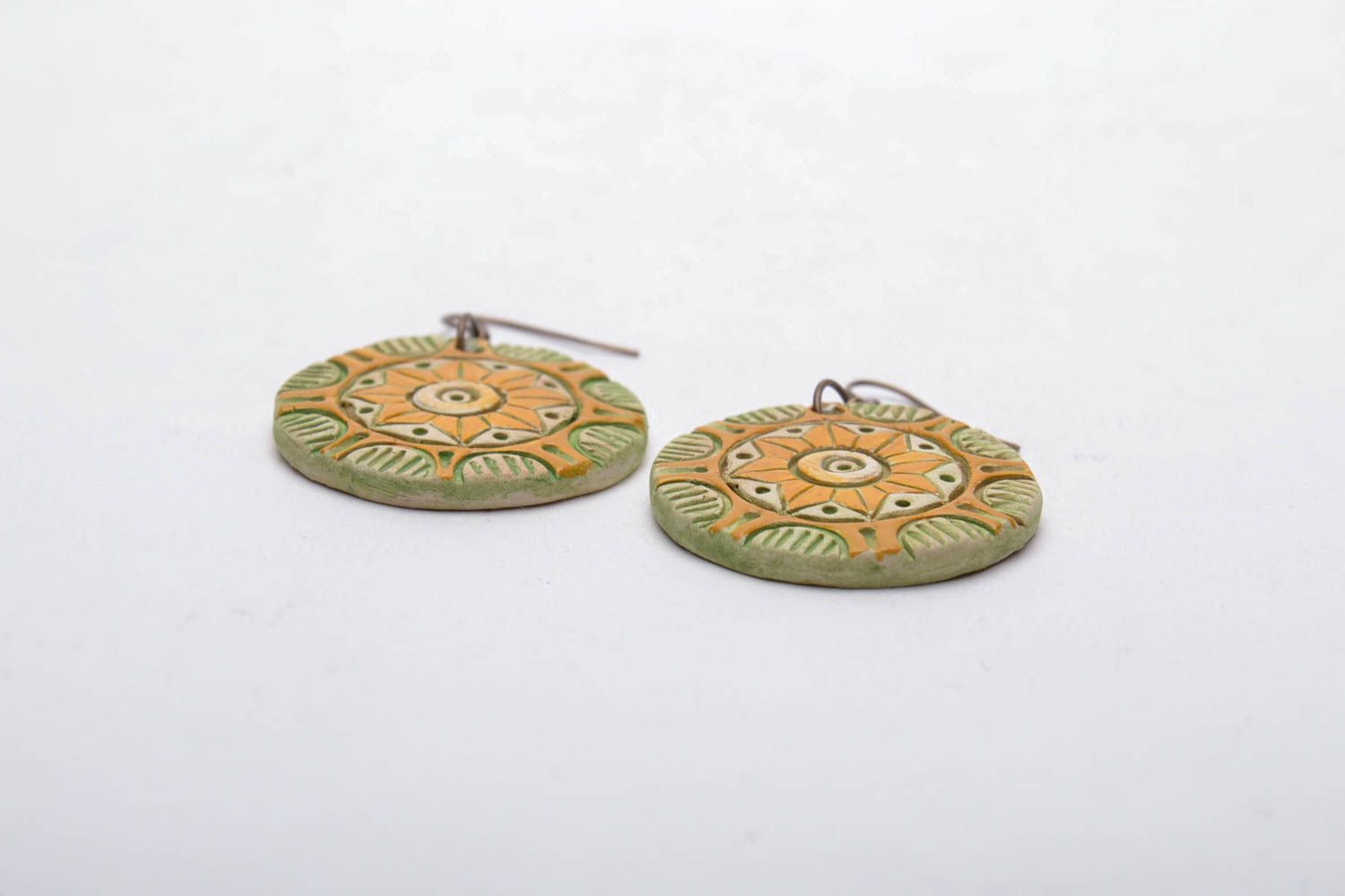 Round clay earrings in ethnic style photo 4