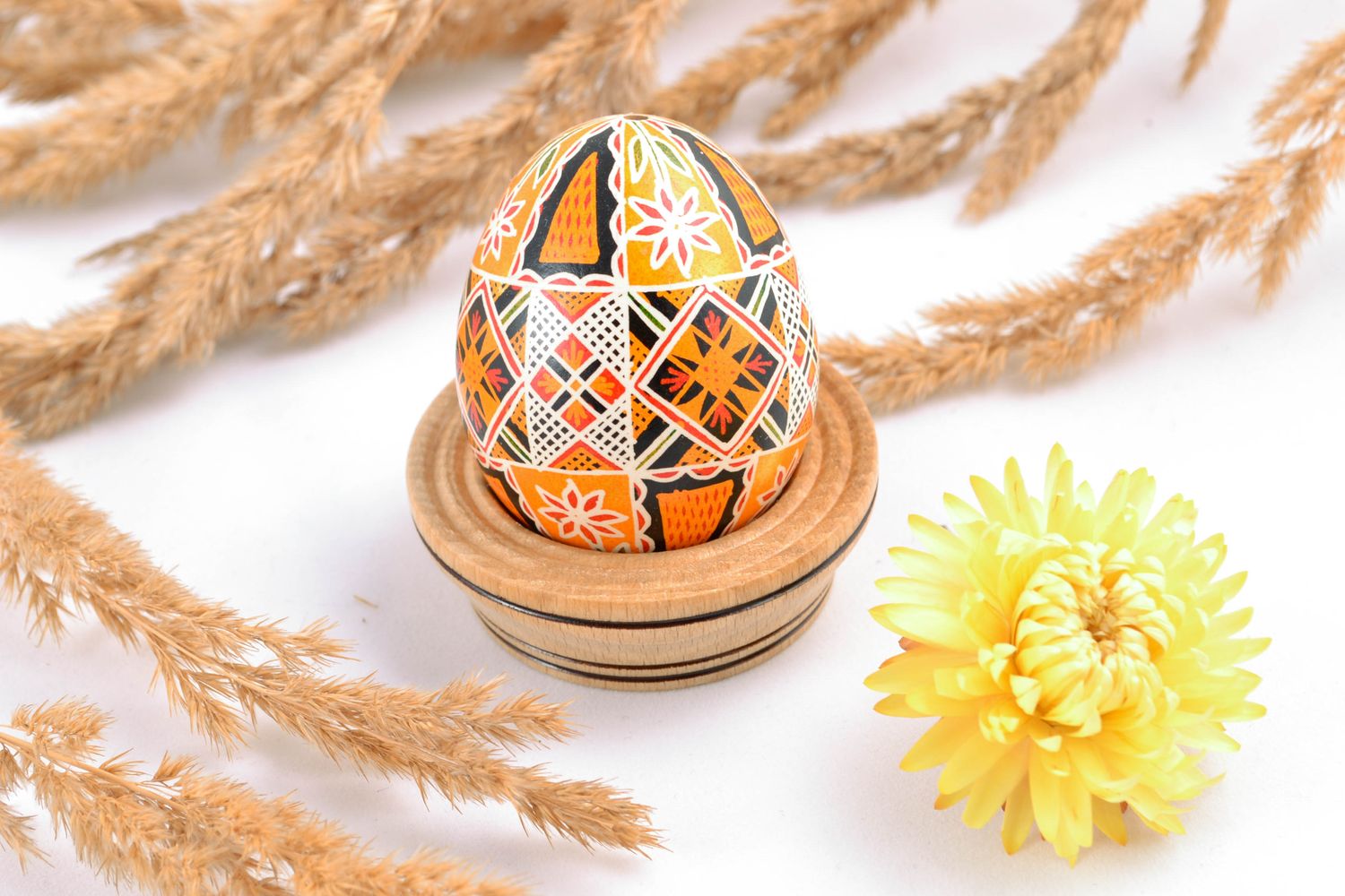 Beautiful painted Easter egg in ethnic style photo 1