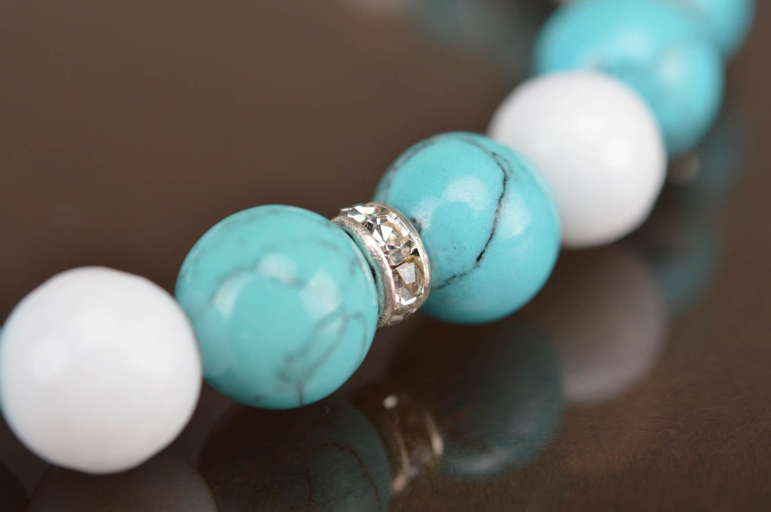 Women's handmade designer woven wrist bracelet with white and turquoise beads photo 3