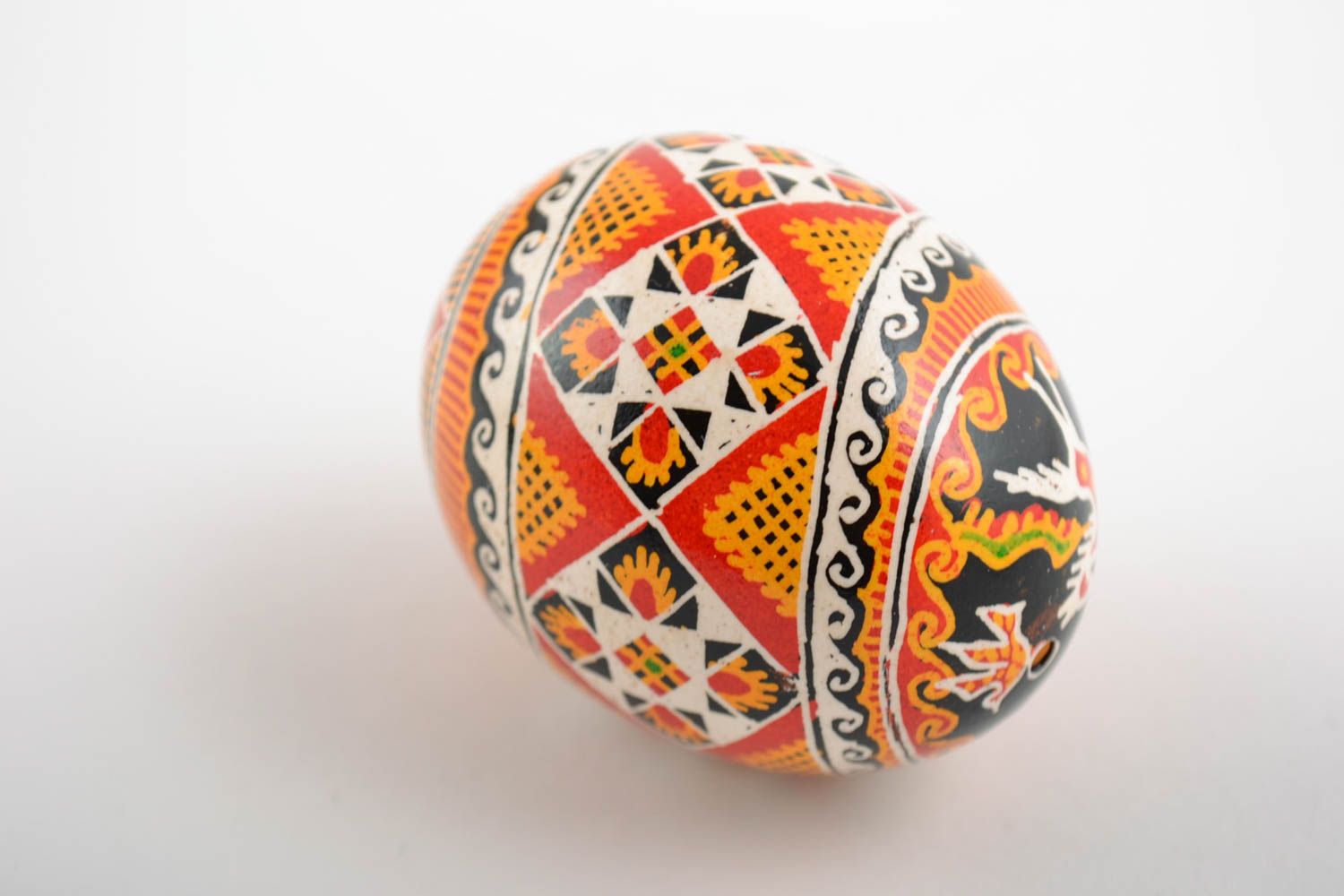 Beautiful handmade painted Easter egg with folk ornaments photo 3