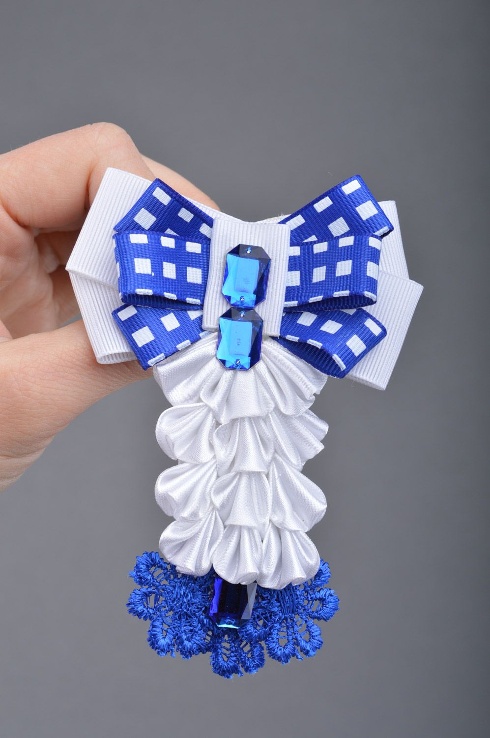 Handmade women's rep ribbon tie brooch of blue and white colors photo 2