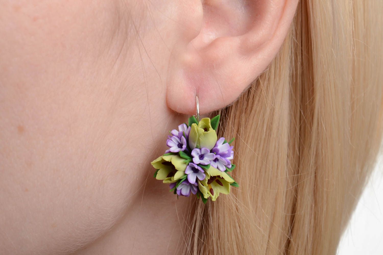 Handmade festive earrings with violet and green polymer clay floral compositions photo 1