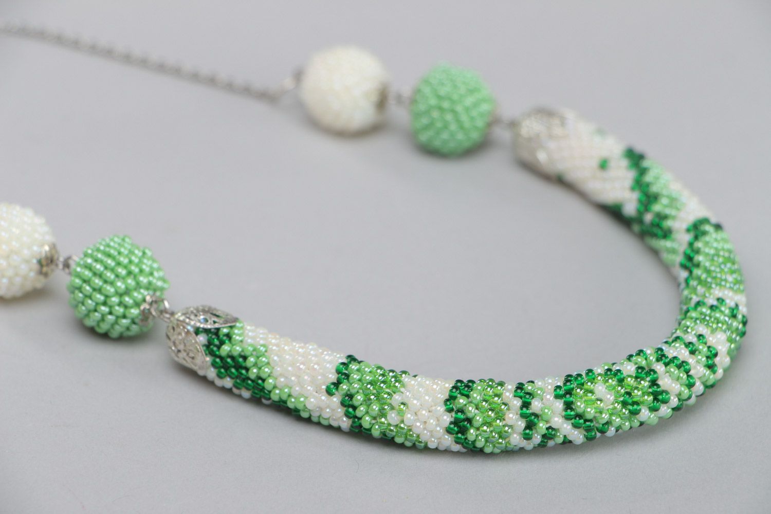 Unusual spring handmade Czech bead cord necklace of white and green colors photo 3