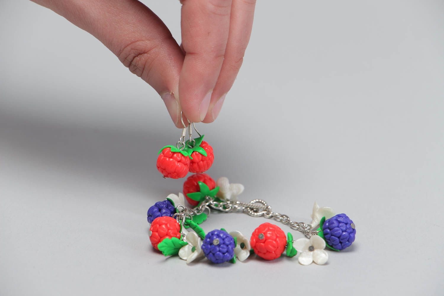Set of handmade accessories jewelry made of clay cute bracelet and earrings photo 5