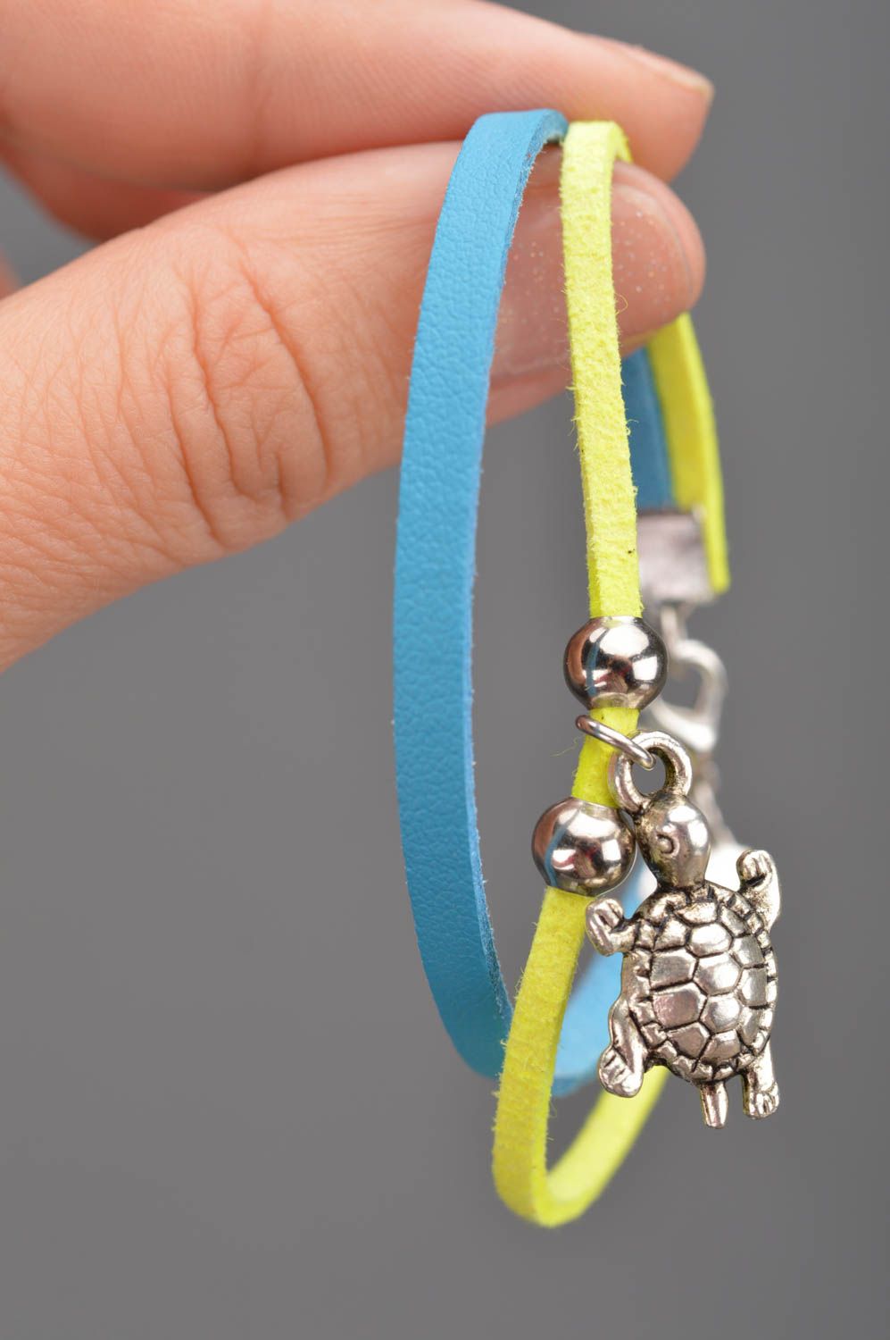 Handmade yellow and blue genuine leather and suede wrist bracelet with charm photo 2