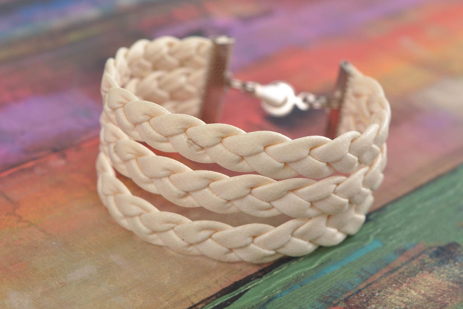 Beautiful handmade wide braided faux leather wrist bracelet of light color photo 1