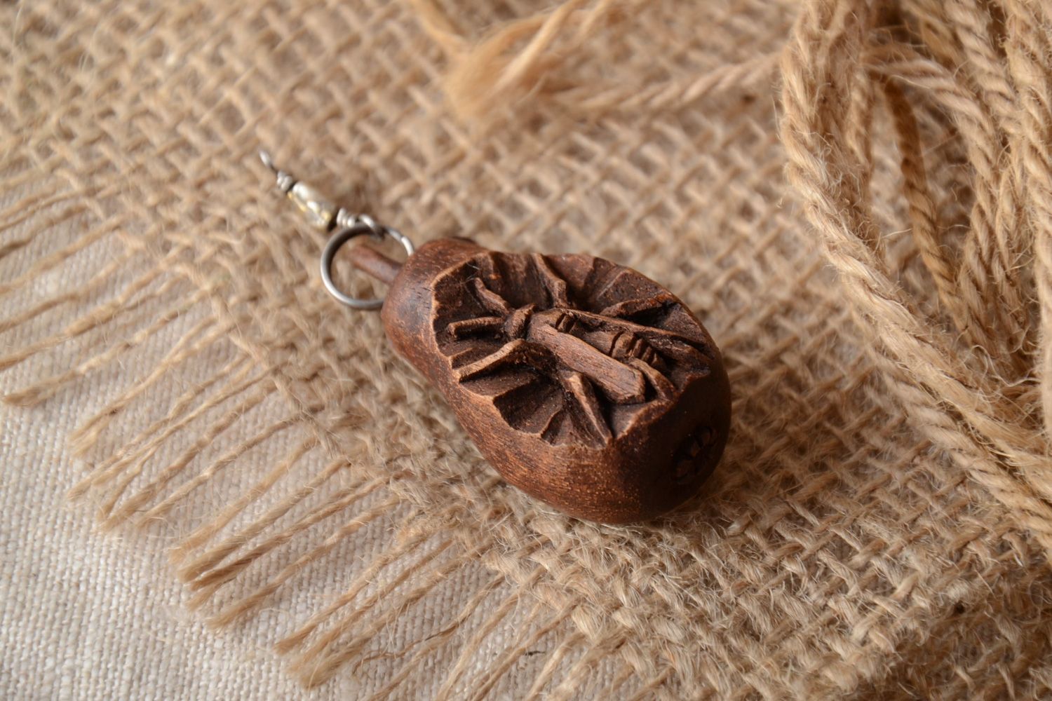 Small handmade decorative keychain carved of natural wood tinted and varnished  photo 1